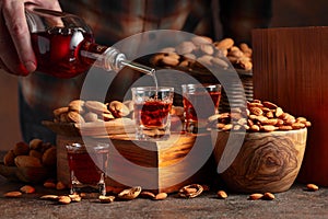 Italian liqueur Amaretto with almonds nuts