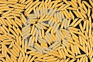 Italian Macaroni Pasta Penne Rigate raw food background