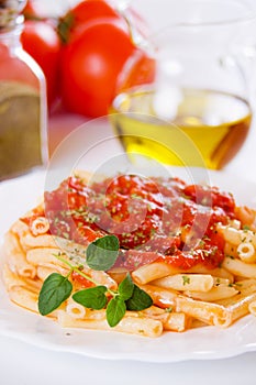 Italian macaroni pasta with tomato sauce