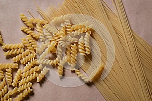 Italian Macaroni raw food background or texture:pasta, spaghetti , pasta in shape of spiral