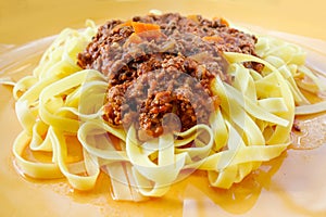 Italian meat sauce pasta on the table