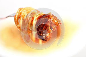 Italian meatball on fork horizontal