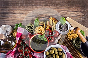 Italian and Mediterranean food ingredients on old wooden background.