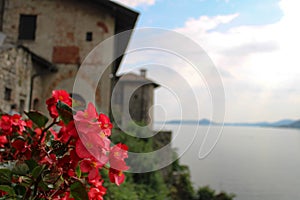 Floreal view of a cloister overlooking the lake during a cloudy day photo