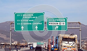 Italian motorway with many indications to main cities photo