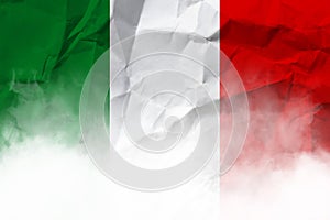 Italian national flag on crumpled paper