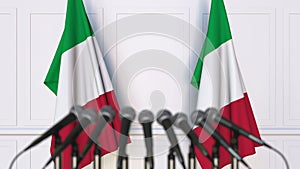 Italian official press conference. Flags of Italy and microphones. Conceptual 3D rendering