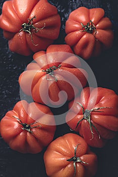 Italian Oxheart tomatoes Cuore di Bue background, macro