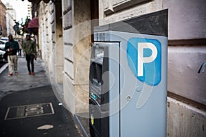 Italian Parking Machine Selling Parking Tickets on Blur Background.