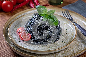 Italian pasta al nero di seppia photo