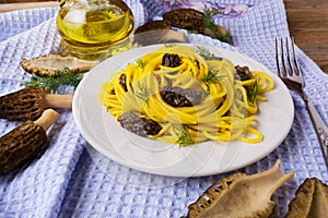 Italian pasta with black morel