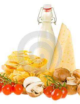 Italian pasta dish ingredients isolated on white (fresh tagliatelli, parmesan cheese, mushrooms, cherry tomatoes, cream)