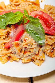 Italian pasta farfalle butterfly bow-tie and tomato sauce