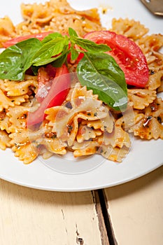 Italian pasta farfalle butterfly bow-tie and tomato sauce