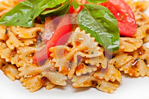 Italian pasta farfalle butterfly bow-tie and tomato sauce