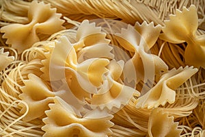Italian pasta farfalle and vermicelli close-up. Food background