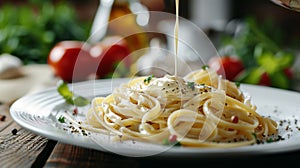 Italian pasta fettuccine alfredo, sause on plate Closeup