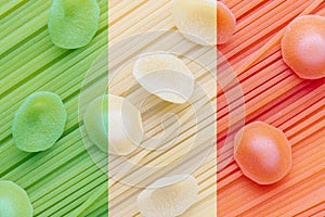 Italian pasta with the Italian flag colors red, white and green .Conceptual photo of Italian traditional food. made in italy