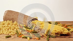 Italian pasta, Italian pasta ingredients, flour, pasta assortment of olive oil in a bottle, still life, spices spaghetti, studio