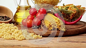 Italian pasta, Italian pasta ingredients, flour, pasta assortment of olive oil in a bottle, still life, spices spaghetti, studio