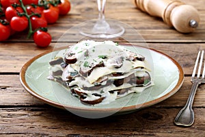 Italian pasta lasagna with mushroom in metal pan
