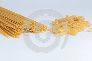 Italian pasta macaroni isolated on white background. Space for text