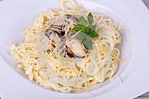 Italian pasta with mussels and cheese