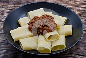 Italian Pasta Paccheri with Chianina ragout in a plate
