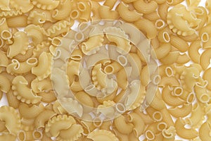 Italian pasta pennette from durum wheat, top view