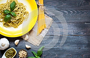 Italian pasta with pesto sauce made with basil leaf