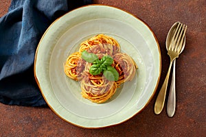 Italian pasta with ragu` bologenese in ceramic bowl