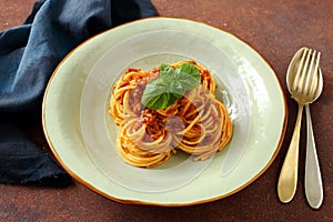 Italian pasta with ragu` bologenese in ceramic bowl