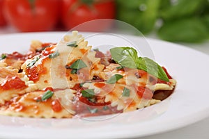 Italian Pasta Ravioli with tomatoes and basil meal