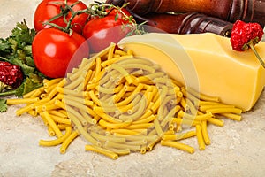 Italian pasta raw Maccheroni for cooking