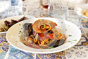 Italian Pasta with seafood Spaghetti allo scoglio, with shrimps, mussels,