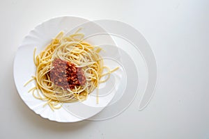 Italian Pasta Spaghetti Bolognese On White Plate.