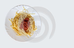 Italian Pasta Spaghetti Bolognese On White Plate.
