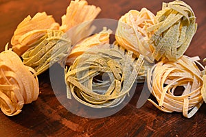 Italian pasta tagliatelle paglia e fieno photo