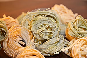 Italian pasta tagliatelle paglia e fieno photo