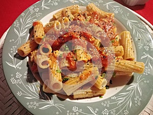 Italian pasta with tomato sauce and bottarga