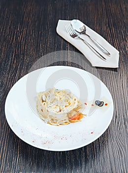 Italian pasta with white sauce. Fettuccine pasta. Tagliatelle