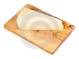 Italian Pecorino Romano cheese on board isolated