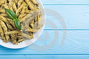 Italian penne pasta with sauce pesto