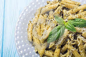 Italian penne pasta with sauce pesto