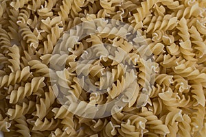 Italian Penne Rigate Macaroni Pasta raw food background or texture