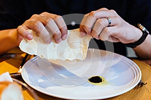 Italian Piadina tear by hands with balsamic in plate