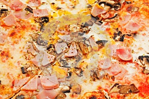 Italian pizza with fungi and prosciutto cotto photo