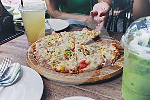 italian pizza hawaiian dressing style ready to eating on wood plate