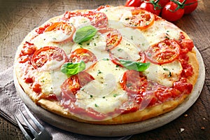 Italian pizza with melted cheese