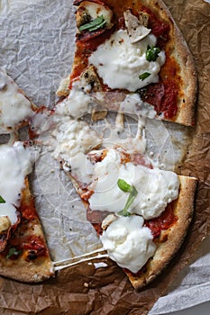 Italian pizza with mozzarella and basil